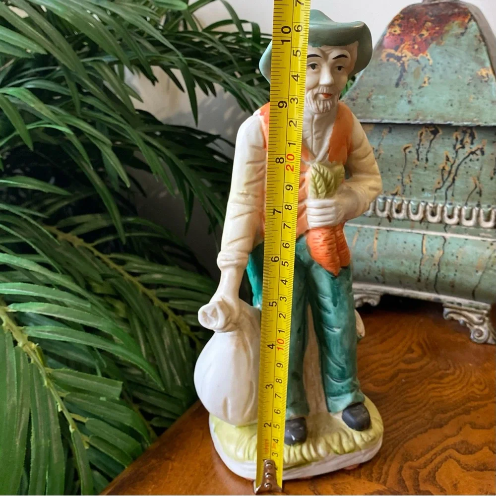 Vintage Ceramic Farmer Figurine in Green and Orange